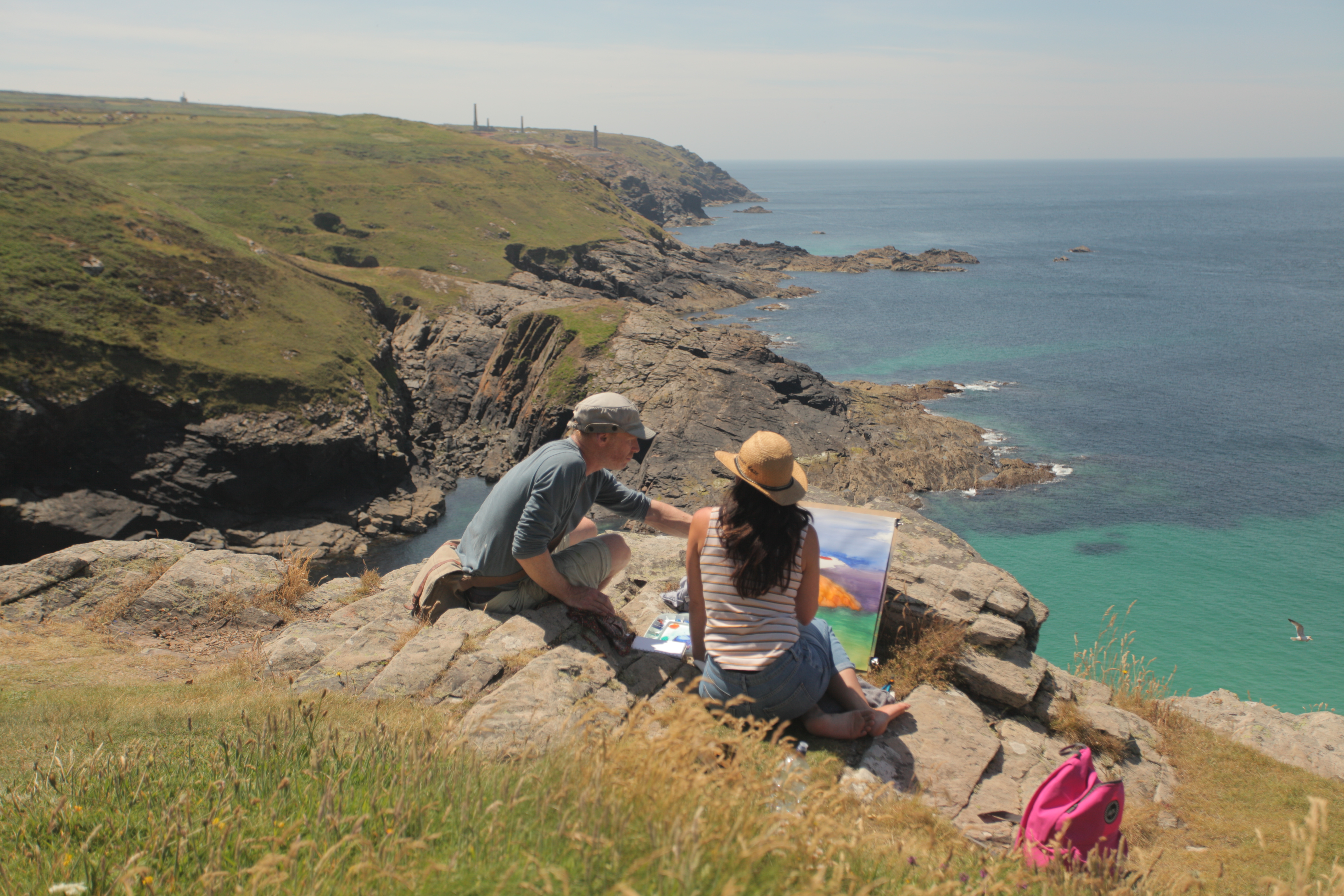 Artists overlooking the Cornish coast