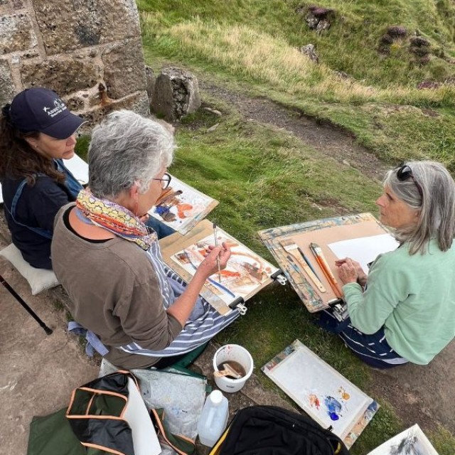 Artists Painting green landscape