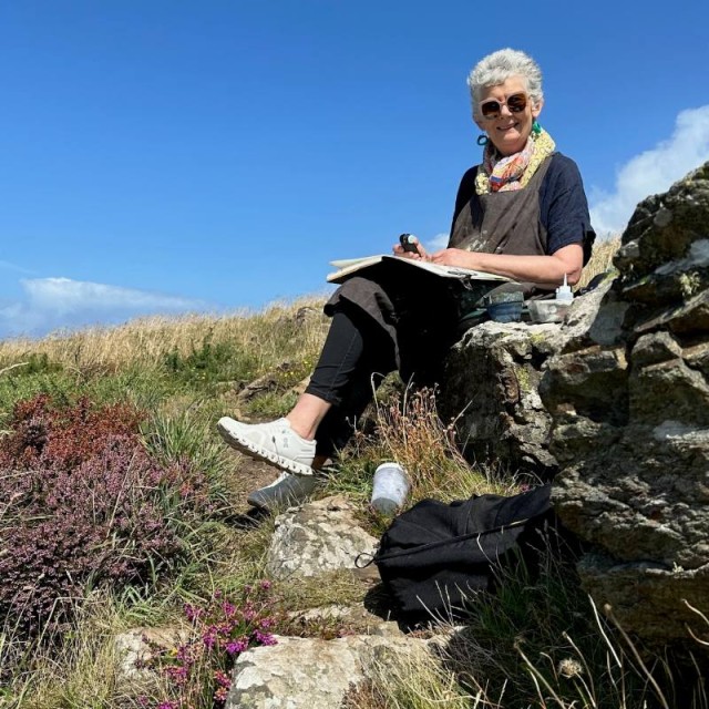 Debbie Mackinnon- sketching on cliff edge